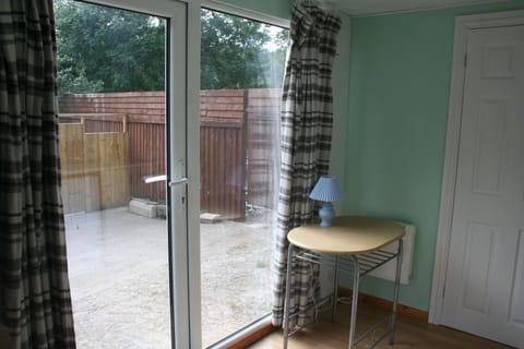 Basic Cabin, 1 Double Bed | Living area | Flat-screen TV