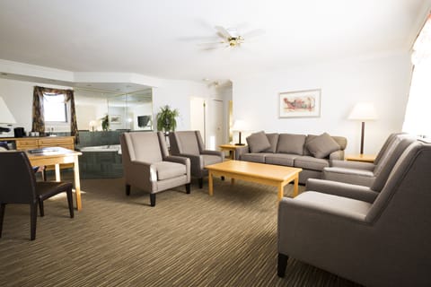 Deluxe Suite, 2 Bedrooms, Non Smoking, Microwave | Living area | 42-inch flat-screen TV with cable channels, TV, iPod dock