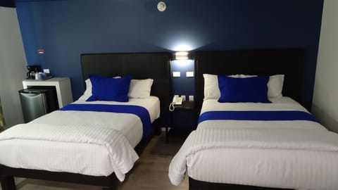 Executive Room, 2 Double Beds, Refrigerator | In-room safe, desk, iron/ironing board, free WiFi