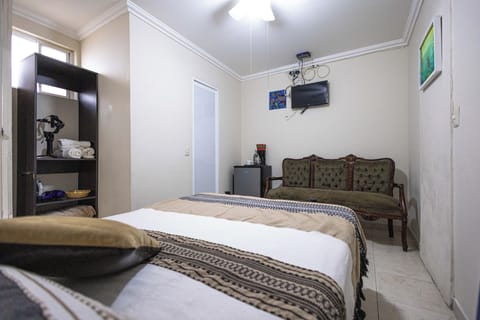 Standard Room, 2 Double Beds | Down comforters, individually decorated, individually furnished