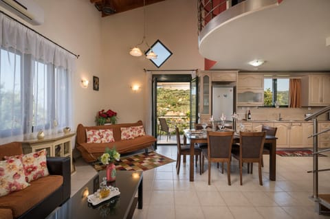 Villa | Living area | 42-inch TV with satellite channels