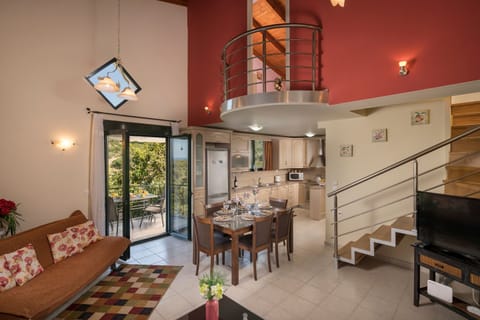 Villa | Living area | 42-inch TV with satellite channels