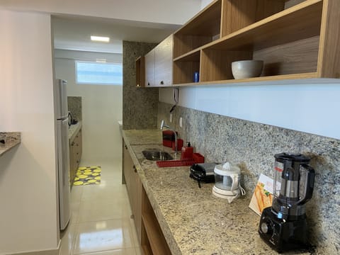 Deluxe Apartment | Private kitchen | Fridge, microwave, coffee/tea maker, blender