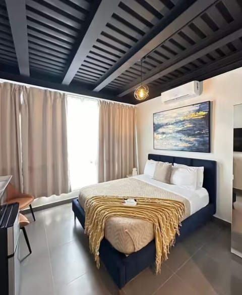 Comfort Room, 1 Queen Bed, Beachside | Individually decorated, individually furnished, free WiFi, bed sheets