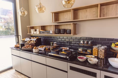 Daily buffet breakfast (EUR 21 per person)