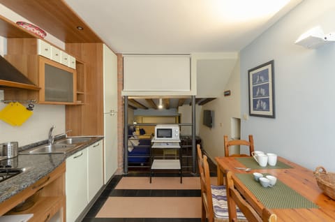 Apartment | Private kitchen | Fridge, cookware/dishes/utensils, dining tables