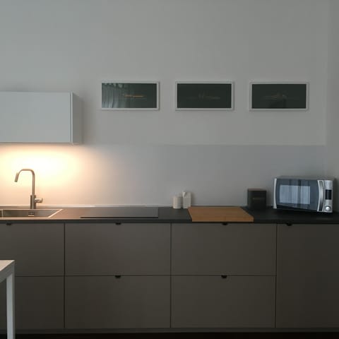 Apartment | Private kitchen | Electric kettle, dining tables