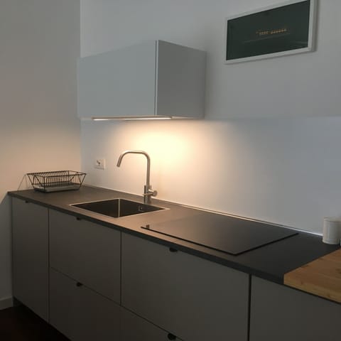 Apartment | Private kitchen | Electric kettle, dining tables