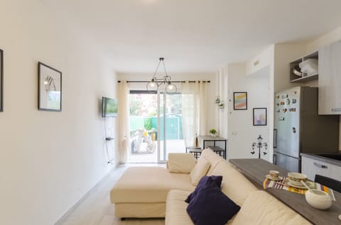 Apartment | Living area | 20-inch flat-screen TV with cable channels, TV