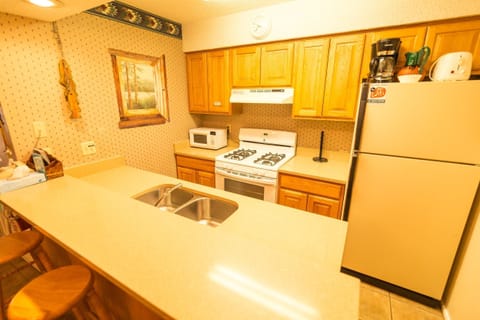 18B - 4 Bedroom Condo | Private kitchen | Full-size fridge, microwave, oven, stovetop