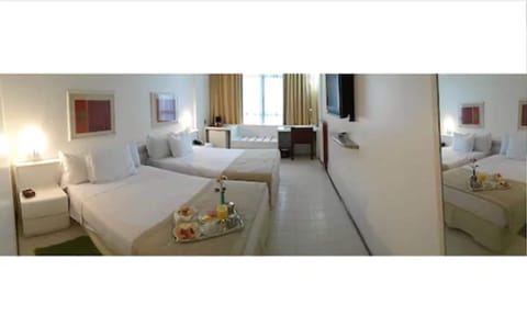 Twin Room | Minibar, desk, blackout drapes, free WiFi