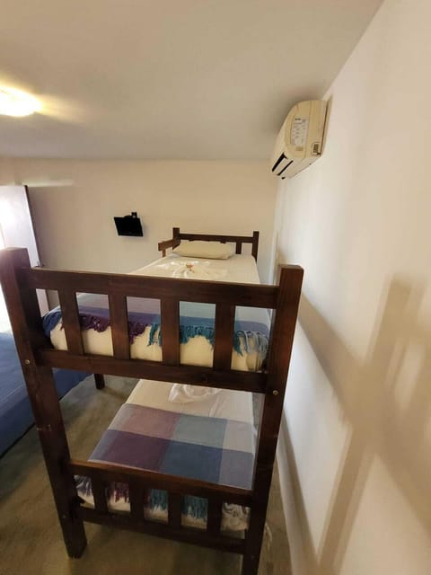 Quadruple Room, 2 Bedrooms, Pool View | Iron/ironing board, free WiFi