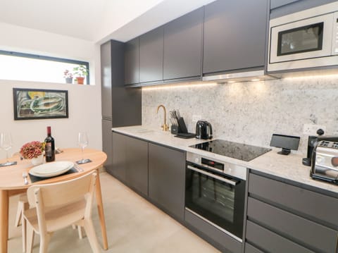 Fridge, electric kettle, toaster, cookware/dishes/utensils