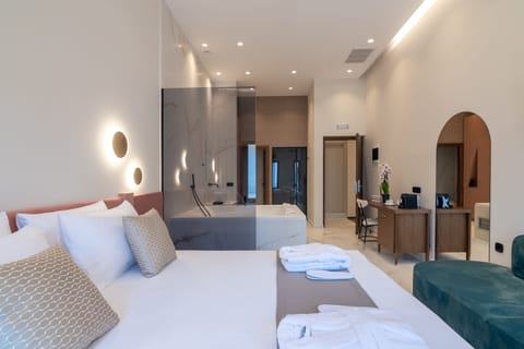 Deluxe Suite, City View (Indoor Jetted Tub) | 1 bedroom, Egyptian cotton sheets, premium bedding, down comforters