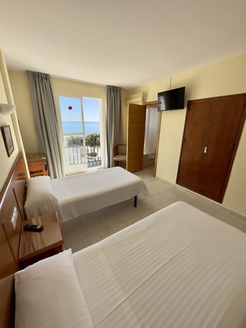 Double or Twin Room, Sea View | Desk, blackout drapes, free WiFi, bed sheets