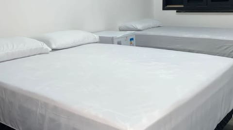 Economy Suite, Sea View | Hypo-allergenic bedding, minibar, free WiFi, bed sheets