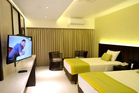 Deluxe Twin Room, Pool View | Laptop workspace, free WiFi