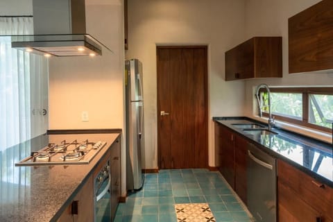 Family Suite, 2 Bedrooms | Private kitchen | Full-size fridge, microwave, oven, stovetop