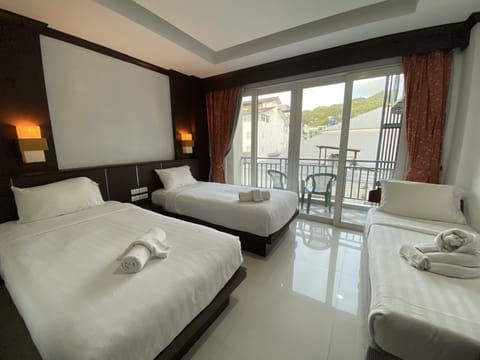 Family Triple Room, 1 Bedroom, Non Smoking, City View | Premium bedding, minibar, in-room safe, desk