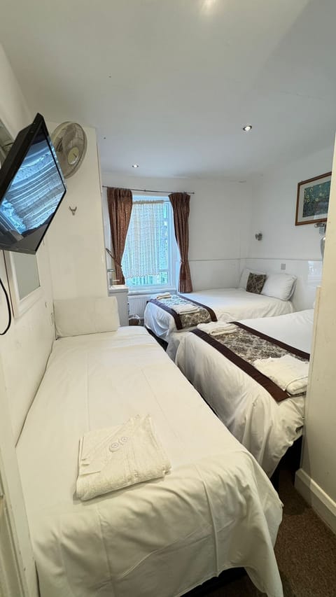 Family Room | Iron/ironing board, free WiFi, bed sheets