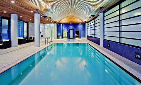 Indoor pool, open 6:00 AM to 11:00 PM, sun loungers