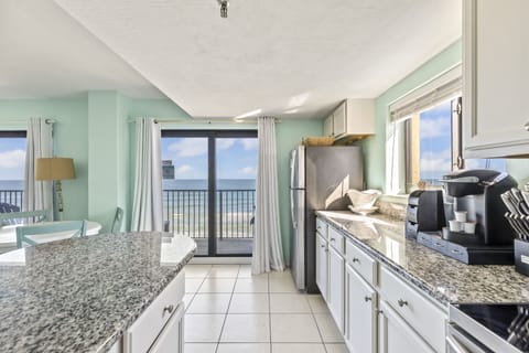 Southern Breeze Penthouse 1003 | Private kitchen | Full-size fridge, microwave, oven, stovetop