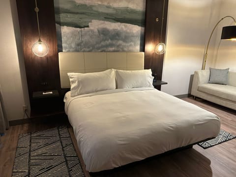 Premium bedding, down comforters, pillowtop beds, in-room safe