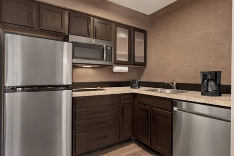 Suite, 1 Bedroom | Private kitchen | Fridge, microwave, stovetop, dishwasher