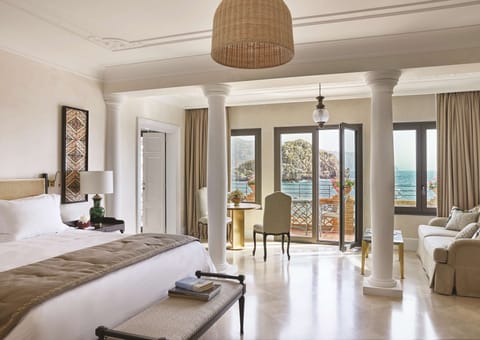 Suite (Villa Sant Andrea) | Down comforters, minibar, in-room safe, individually furnished