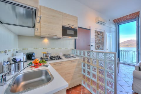 Honeymoon Apartment, 2 Bedrooms, 2 Bathrooms, Lakeside (La Dolce Vita Pied dans L' Eau) | Private kitchen | Fridge, microwave, stovetop, espresso maker