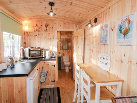 Fridge, electric kettle, toaster, cookware/dishes/utensils