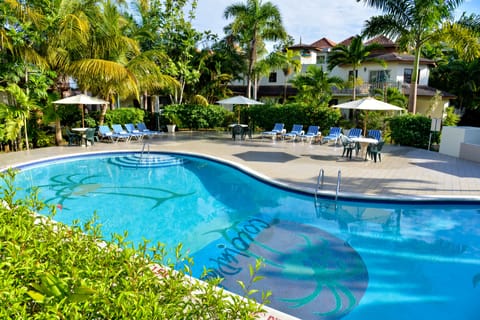 2 outdoor pools, pool umbrellas, sun loungers