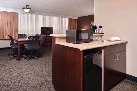 Suite, 1 King Bed, Refrigerator & Microwave, River View | Pillowtop beds, desk, laptop workspace, blackout drapes