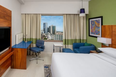 Deluxe Room, 1 Queen Bed, City View, Poolside | Egyptian cotton sheets, premium bedding, memory foam beds, in-room safe