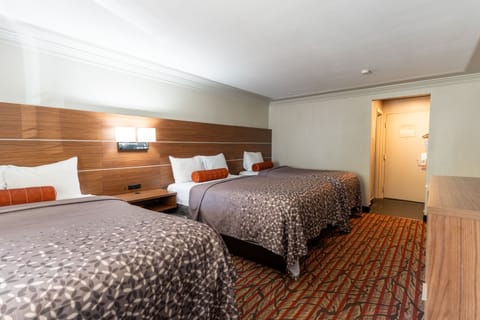 Deluxe Room, Multiple Beds | Desk, blackout drapes, soundproofing, iron/ironing board