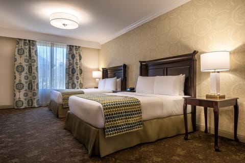 Deluxe Room, 2 Queen Beds, City View | Premium bedding, down comforters, pillowtop beds, in-room safe