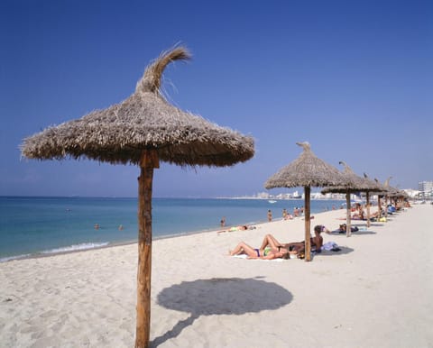 Beach nearby, white sand, sun loungers, beach umbrellas