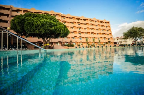 Indoor pool, outdoor pool, pool umbrellas