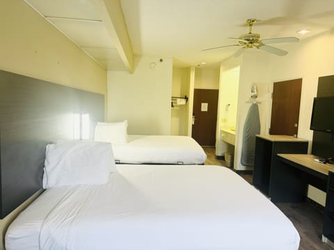 Deluxe Room, 2 Queen Beds | Desk, iron/ironing board, free WiFi, bed sheets