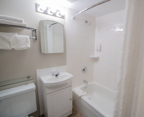 Combined shower/tub, deep soaking tub, free toiletries, hair dryer