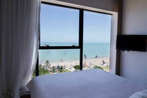 Double Room, Sea View | Minibar, in-room safe, blackout drapes, free WiFi