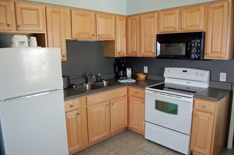 Suite, Multiple Beds, Non Smoking, Ocean View (Second Floor, Two Bedroom Suite) | Private kitchen | Fridge, microwave