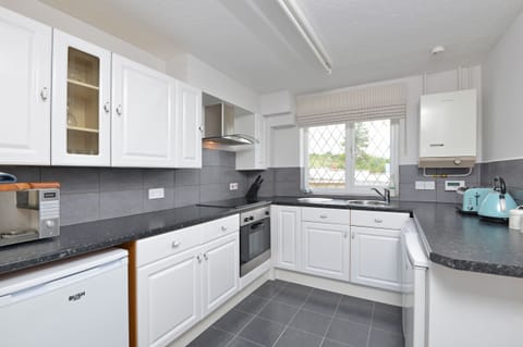 Fridge, dishwasher, electric kettle, toaster