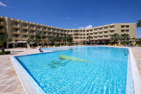 Indoor pool, outdoor pool, pool umbrellas, sun loungers