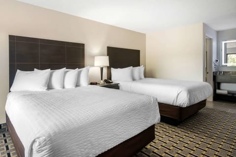 Suite, 2 Queen Beds, Non Smoking | In-room safe, desk, laptop workspace, iron/ironing board