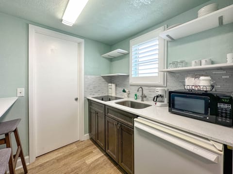 Room, 2 Queen Beds, Kitchenette, Poolside | Private kitchen | Fridge, microwave, coffee/tea maker