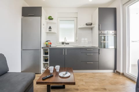 Comfort Apartment (A4) | Private kitchen | Fridge, microwave, oven, stovetop