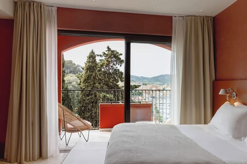 Room, Balcony, Sea View (Maremma) | Minibar, in-room safe, desk, laptop workspace