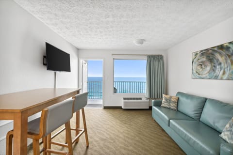 Suite (Ocean/Gulf View) | Living area | 32-inch LCD TV with cable channels, TV