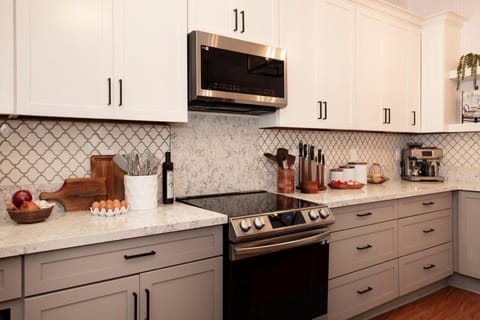 Family Room, Multiple Beds, Garden View | Shared kitchen facilities | Mini-fridge, microwave, coffee/tea maker, cookware/dishes/utensils